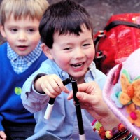 Boy entertained by magic