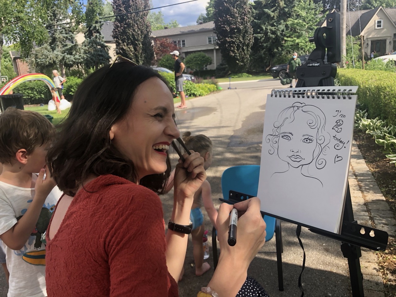 Caricature artist drawing guests at a Toronto event