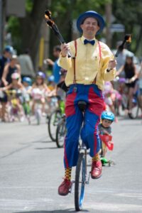 JoJoFun's fire juggler on a unicycle in Toronto